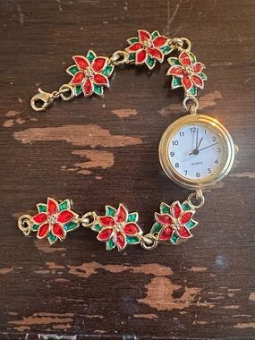 7” enamel on metal Poinsetta Watch bracelet, needs battery